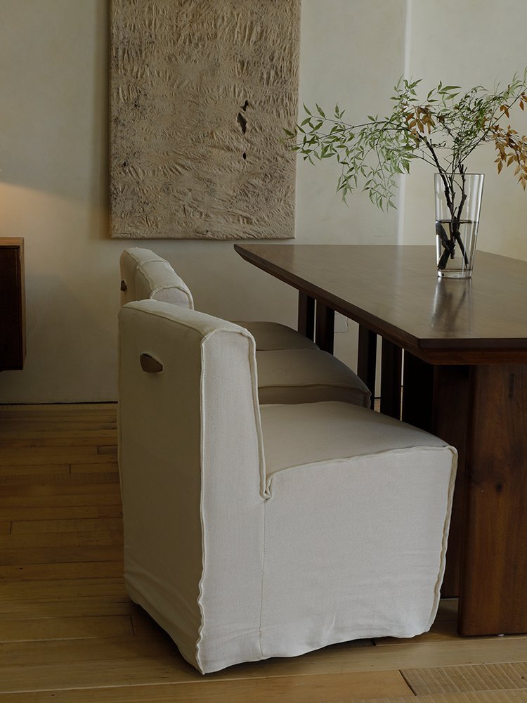 Housse de canapé et chaise à roulettes