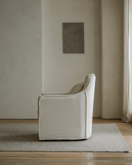 Fauteuil recouvert de tissu Sola