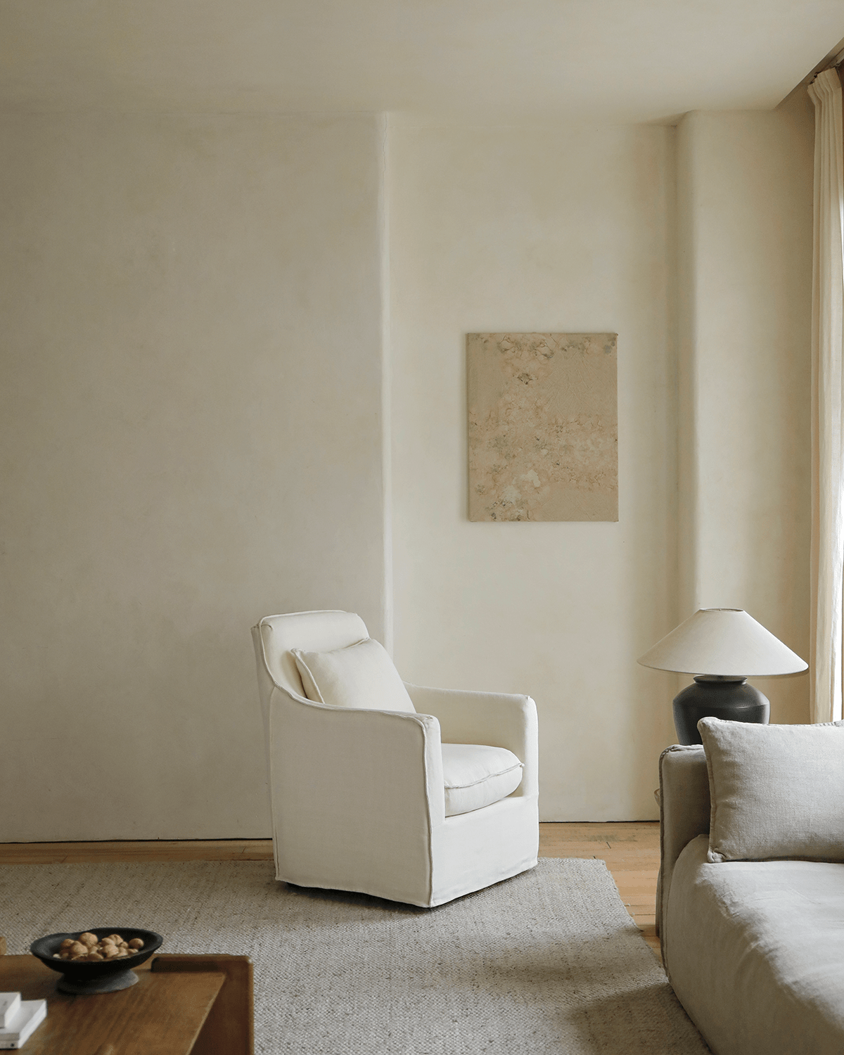 Fauteuil recouvert de tissu Sola