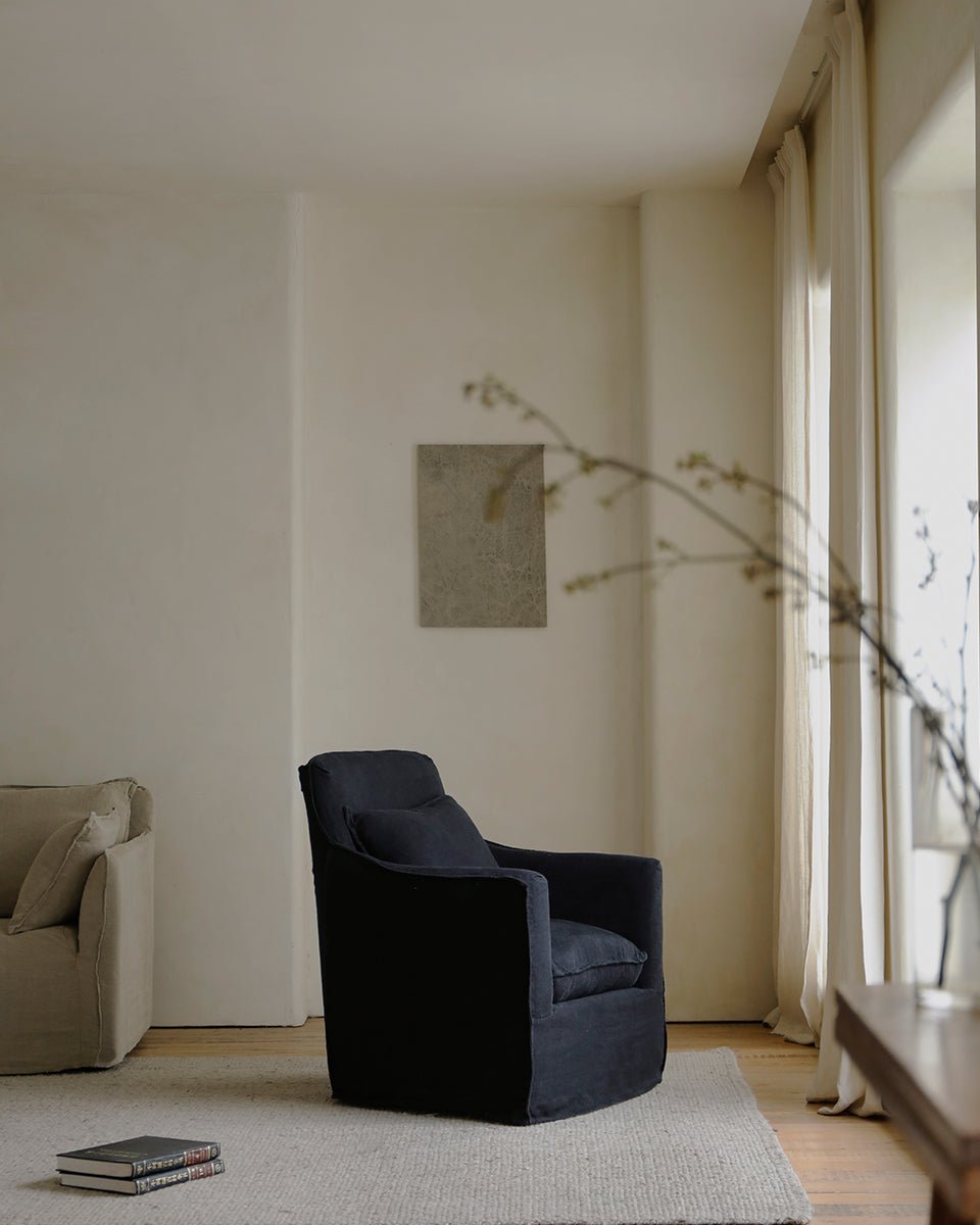 Fauteuil recouvert de tissu Sola